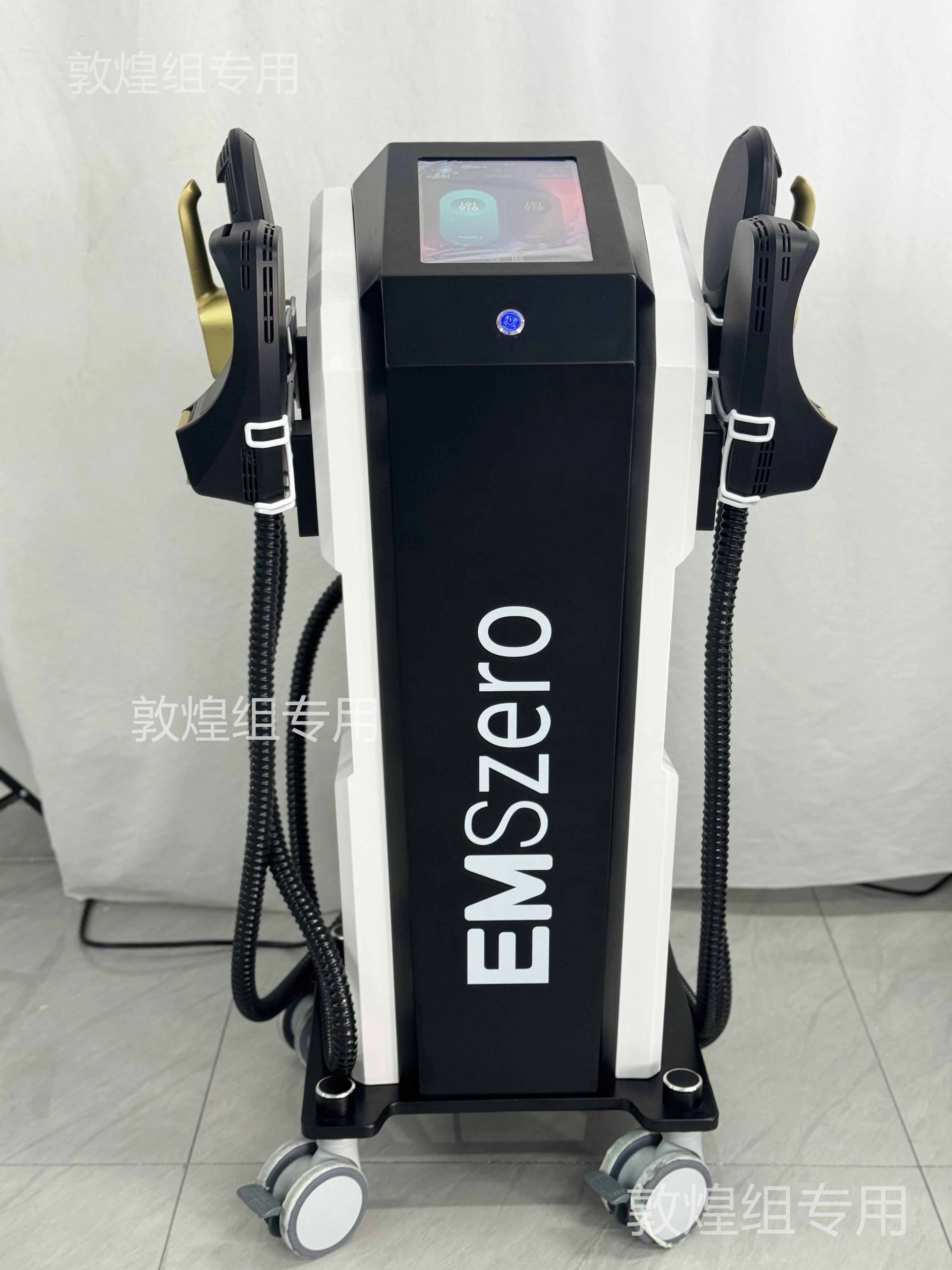 EMS body sculpting machine applicator positioned for targeted muscle stimulation